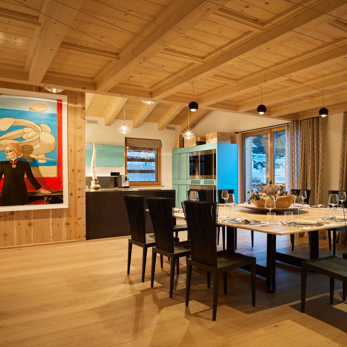   Janette  In the special slate color they surround a large square table in the center of the chalet dining room. 